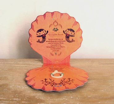 Handmade seashell Valentine with a cold porcelain ring tucked inside, via Misako Mimoko on Etsy