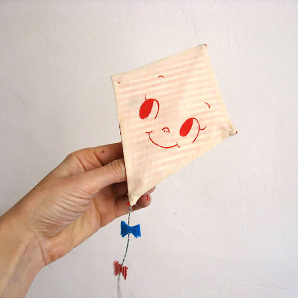 Handmade Kite Valentine with a hand-embroidered Valentine's Day message on the back, from Misako Mimoko on Etsy