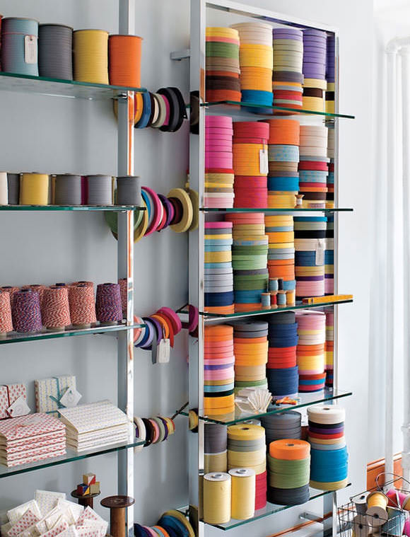 Colorful & organized crafts supplies in bookmaker's studio