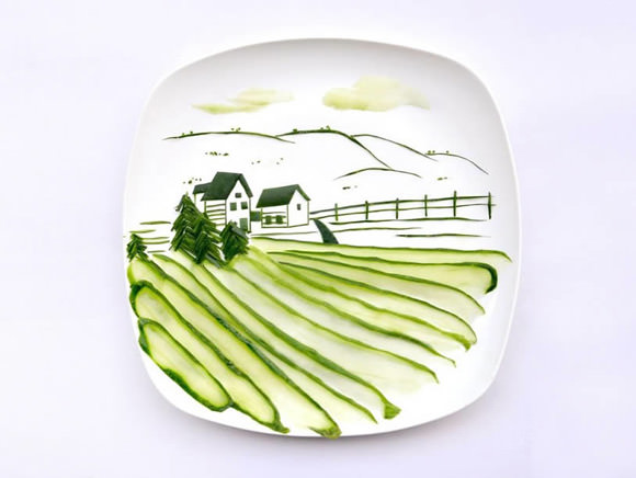 Landscape scene made from a single cucumber by Hong Yi