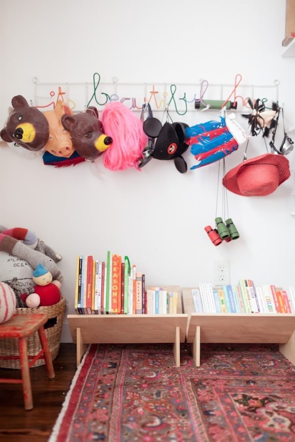 Bookshelf Ideas for Kids' Rooms // low-lying wooden shelves via jordan ferney