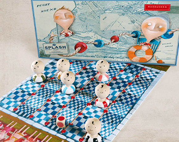 Splash, a handmade take on checkers  with little wooden swimmers
