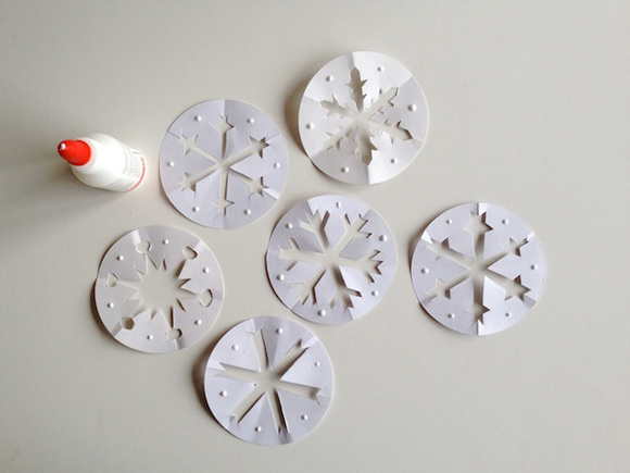 DIY Paper Snowflake Window Decorations