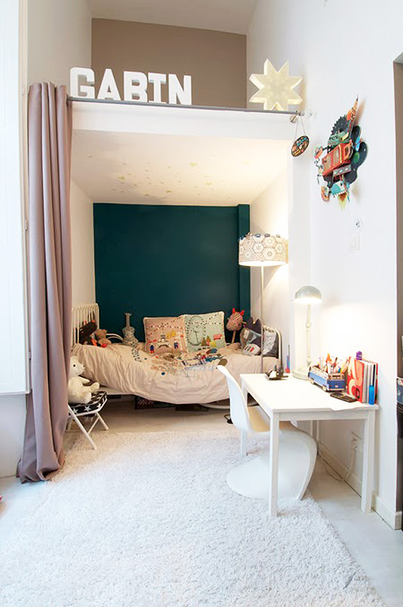 If you don't want to invest in custom bunk beds, just add some curtains to a nook and let your little ones have their own private suite.