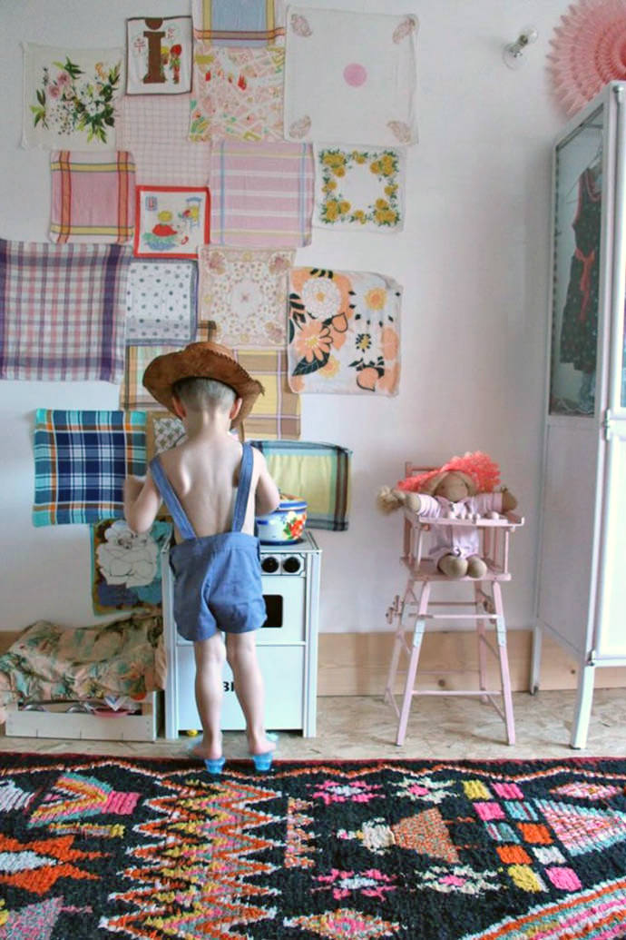 Decorating the kid's room wall with fabric remnants