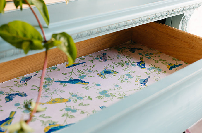 Drawer lined with Waverly botanical fabric 