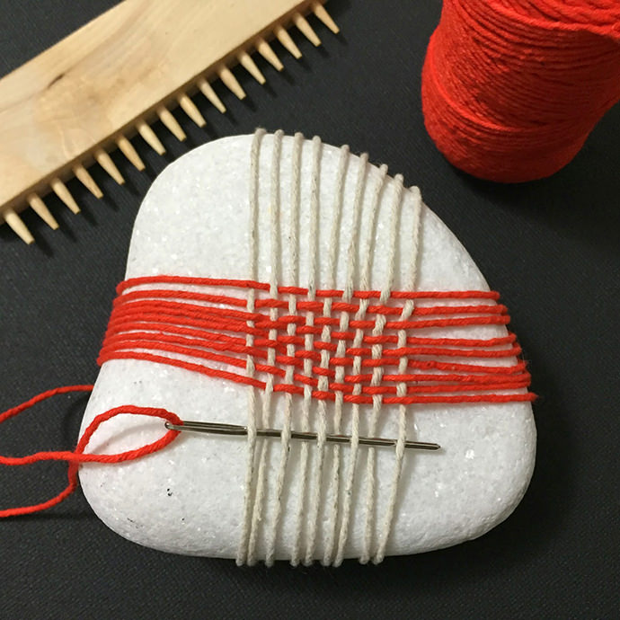 Weaving Stones, image via Paseando Hilos