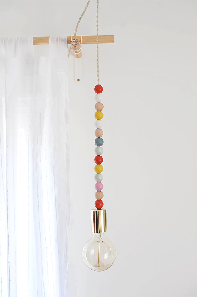 DIY Wooden Bead Pendant Light, tutorial via A New Bloom